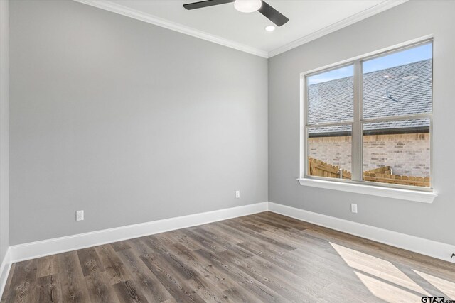 spare room with wood-type flooring, ceiling fan, and crown molding