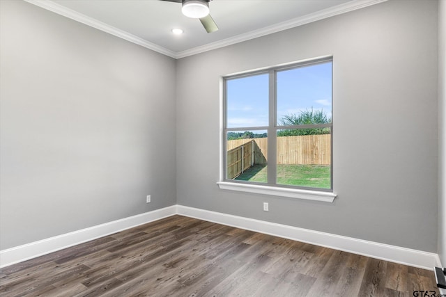 unfurnished room featuring ornamental molding, dark wood-type flooring, and ceiling fan