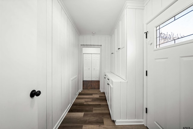 hall with dark hardwood / wood-style floors