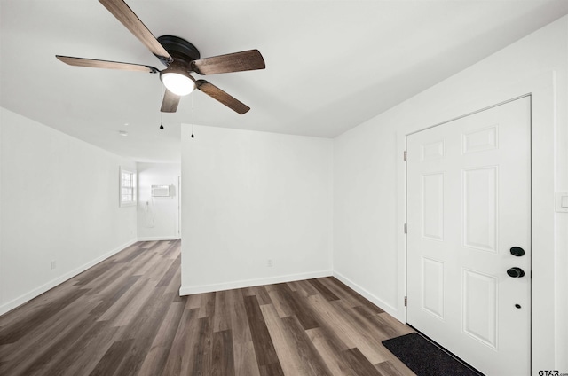 unfurnished room featuring dark hardwood / wood-style flooring and ceiling fan