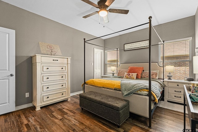 bedroom with baseboards, dark wood-style floors, and ceiling fan