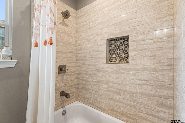 full bathroom with shower / bath combo with shower curtain