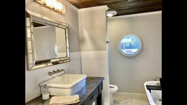 bathroom with sink, ornamental molding, wooden ceiling, and toilet