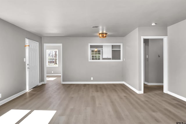 empty room with light wood-type flooring