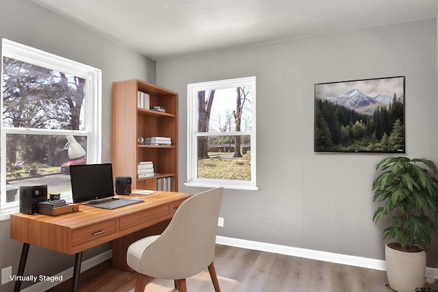 office area featuring dark wood-type flooring