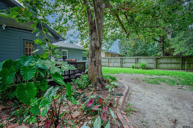 view of yard with a deck