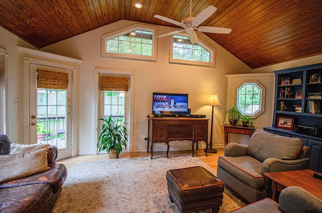 living room featuring a wealth of natural light, wood ceiling, ceiling fan, and light hardwood / wood-style flooring