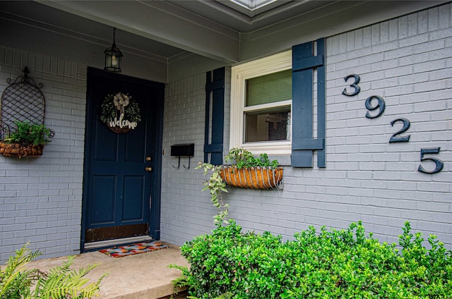 doorway to property with a porch