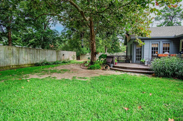 view of yard with a deck