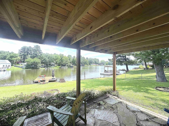 668 Omaha Dr, Omaha, TX 75571 - view of patio / terrace with a water view and a dock