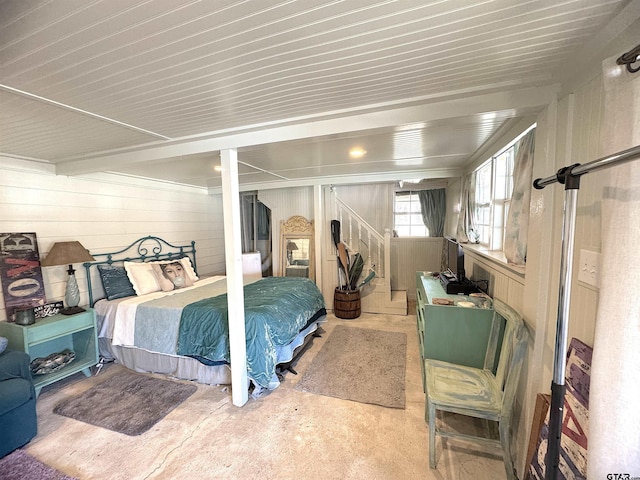 668 Omaha Dr, Omaha, TX 75571 - bedroom featuring wood walls and wooden ceiling