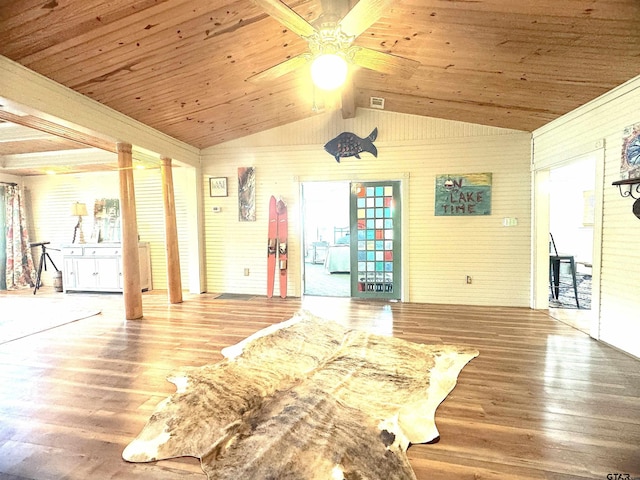 668 Omaha Dr, Omaha, TX 75571 - living room with wood finished floors, lofted ceiling, ceiling fan, wood walls, and wood ceiling