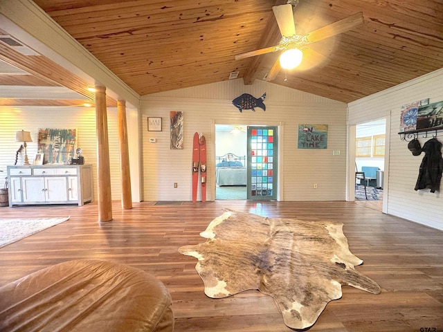 668 Omaha Dr, Omaha, TX 75571 - living room with ceiling fan, wood walls, wood finished floors, and wood ceiling
