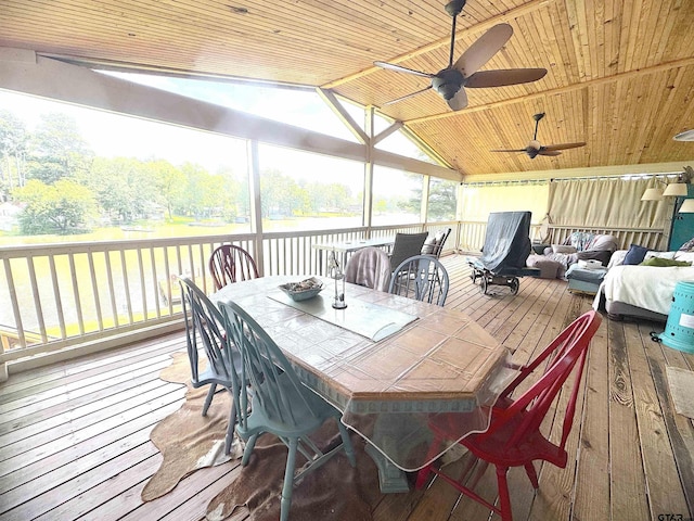 668 Omaha Dr, Omaha, TX 75571 - sunroom featuring outdoor dining space, ceiling fan, vaulted ceiling, and an outdoor living space