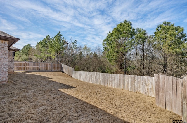 view of yard featuring a fenced backyard