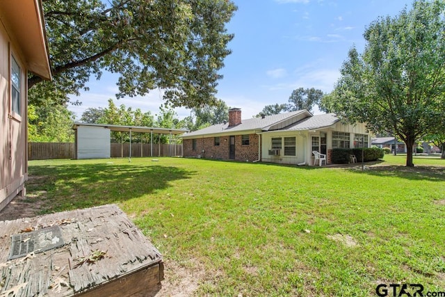 21187 Kristen Dr, Chandler, TX 75758 - fenced backyard featuring a shed