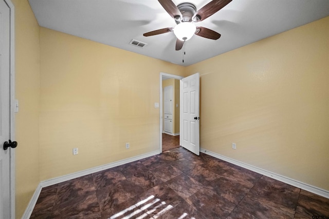 unfurnished room featuring ceiling fan