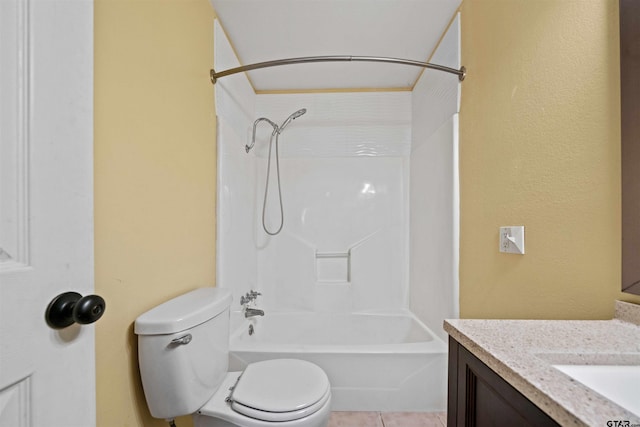 full bathroom with vanity, tile patterned floors, toilet, and shower / washtub combination