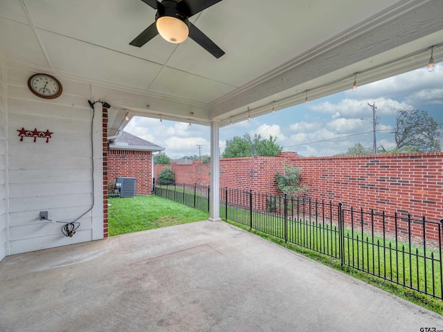 view of patio with central AC unit and ceiling fan