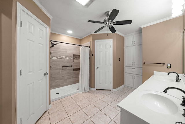 bathroom featuring tile patterned floors, a shower with curtain, vanity, ceiling fan, and crown molding