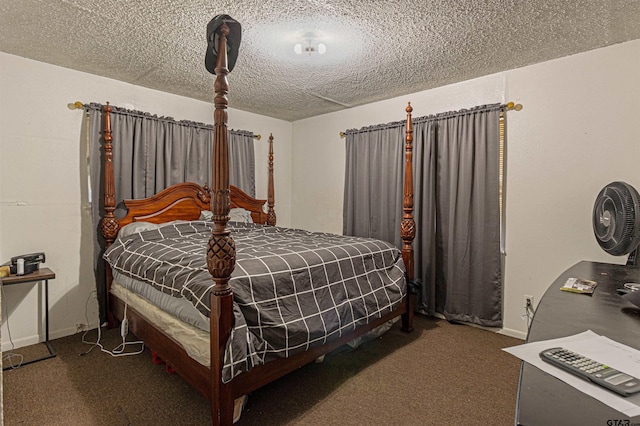 2114 Martin Luther King Blvd, Palestine, TX 75803 - carpeted bedroom featuring a textured ceiling and baseboards
