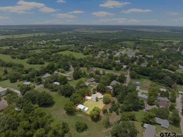 bird's eye view with a residential view and a view of trees