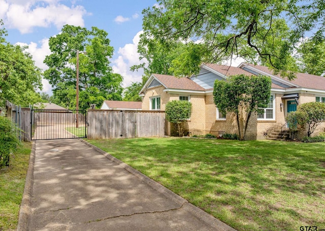 view of yard with a gate and fence