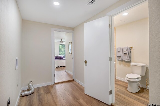 702 W Paschal St, Troup, TX 75789 - hall featuring wood finished floors and recessed lighting