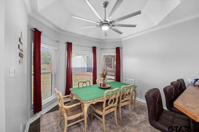 dining area featuring a ceiling fan, baseboards, and ornamental molding