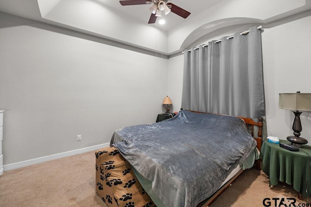 bedroom featuring ceiling fan, carpet floors, and baseboards