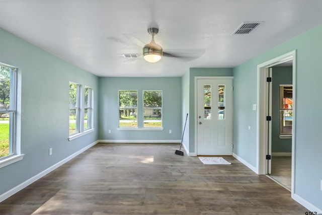 entrance foyer with ceiling fan and dark hardwood / wood-style flooring