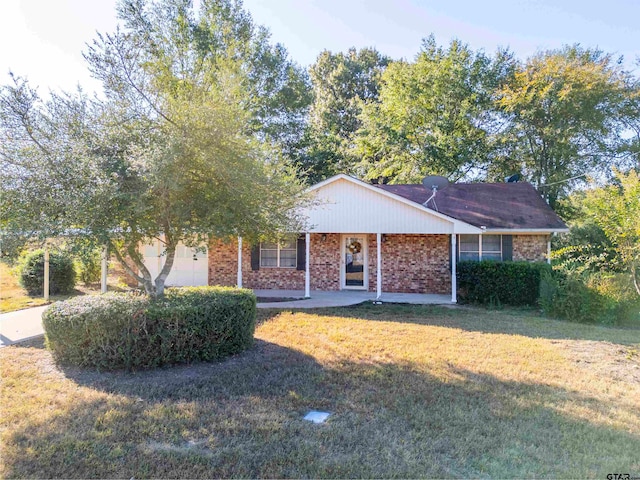 view of front of property with a front yard and covered porch