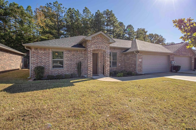 ranch-style home featuring a garage and a front lawn