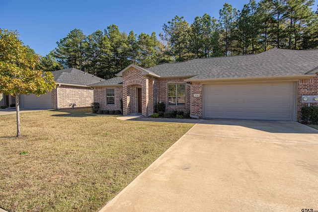 ranch-style house with a front yard and a garage