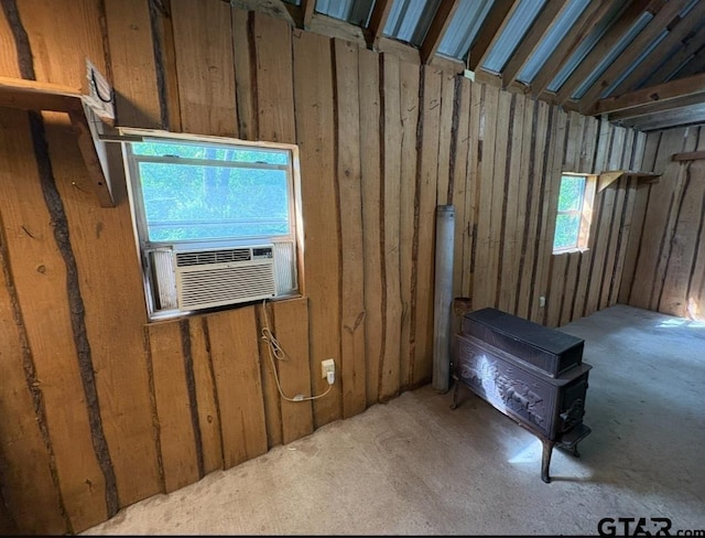 misc room with cooling unit and wooden walls