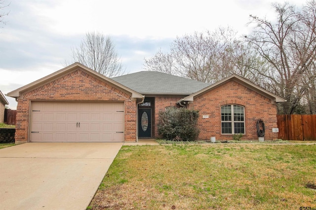 single story home with a garage and a front lawn