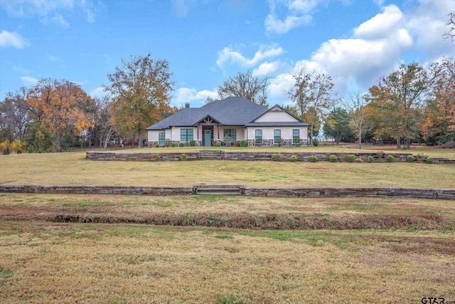 view of front of house with a front yard