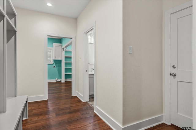 hall with dark hardwood / wood-style floors