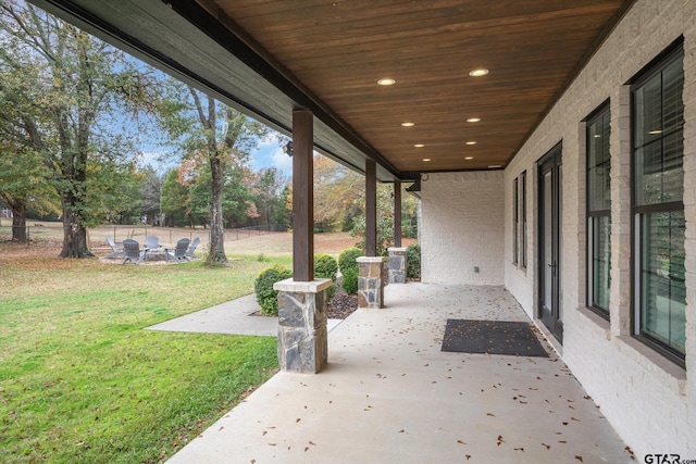 view of patio / terrace featuring an outdoor fire pit