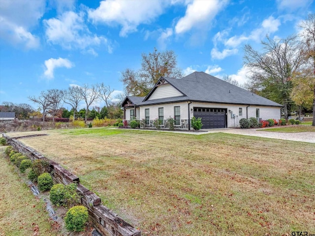 view of front facade featuring a front yard and a garage