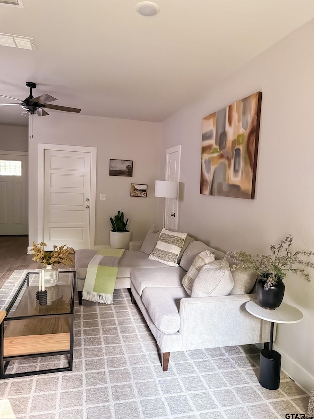 living room with ceiling fan