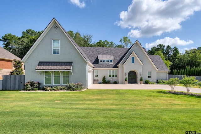 view of front of property with a front lawn