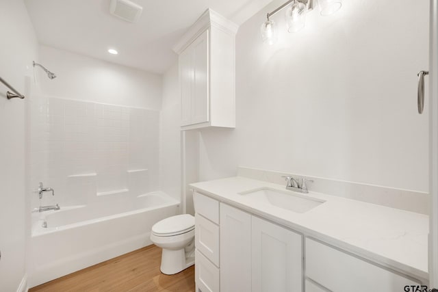 442 Mary Cir, Bullard, TX 75757 - bathroom featuring wood finished floors, toilet, bathtub / shower combination, vanity, and recessed lighting