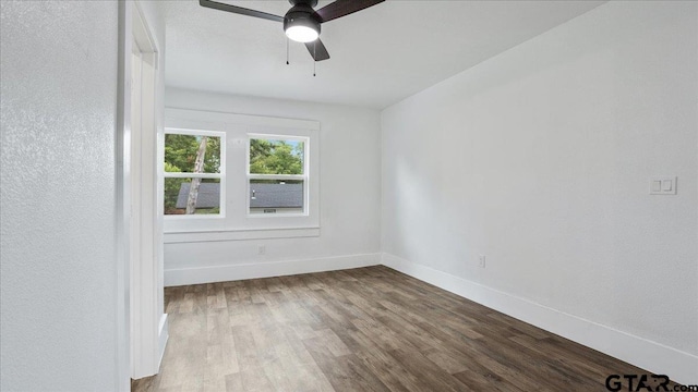 spare room featuring ceiling fan and light wood-type flooring