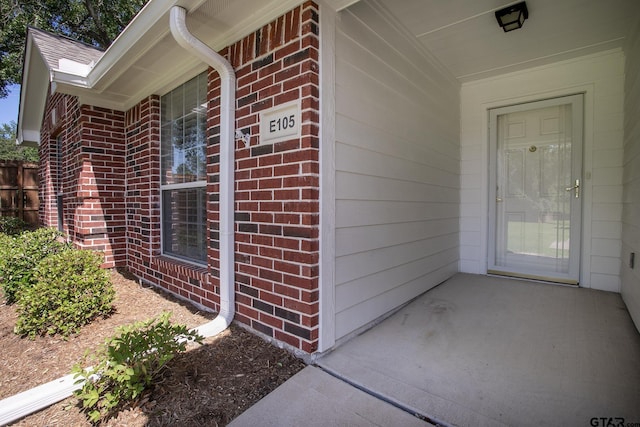 1521 Rice Rd Unit E105, Tyler, TX 75703 - entrance to property featuring brick siding