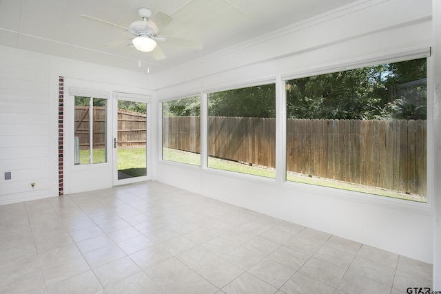 1521 Rice Rd Unit E105, Tyler, TX 75703 - unfurnished sunroom with ceiling fan and healthy amount of natural light