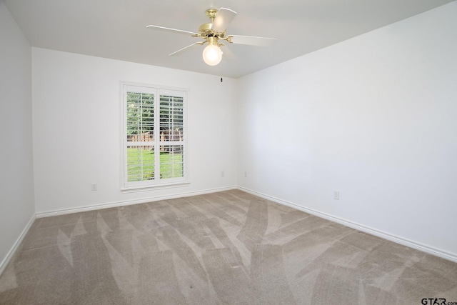 1521 Rice Rd Unit E105, Tyler, TX 75703 - unfurnished room featuring carpet, ceiling fan, and baseboards
