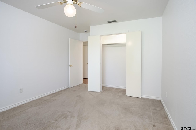 1521 Rice Rd Unit E105, Tyler, TX 75703 - unfurnished bedroom with carpet floors, a ceiling fan, a closet, and baseboards