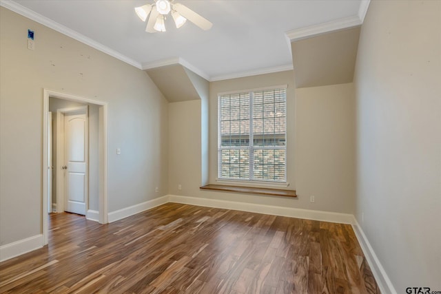 bonus room with dark wood-style floors, ceiling fan, and baseboards