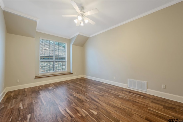 bonus room with dark wood finished floors, lofted ceiling, visible vents, ceiling fan, and baseboards